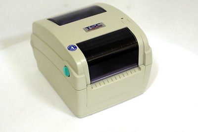 Термотрансферный принтер этикеток TSC TTP-245c (светлый) PSUT+Ethernet (с отделителем) — фото 1